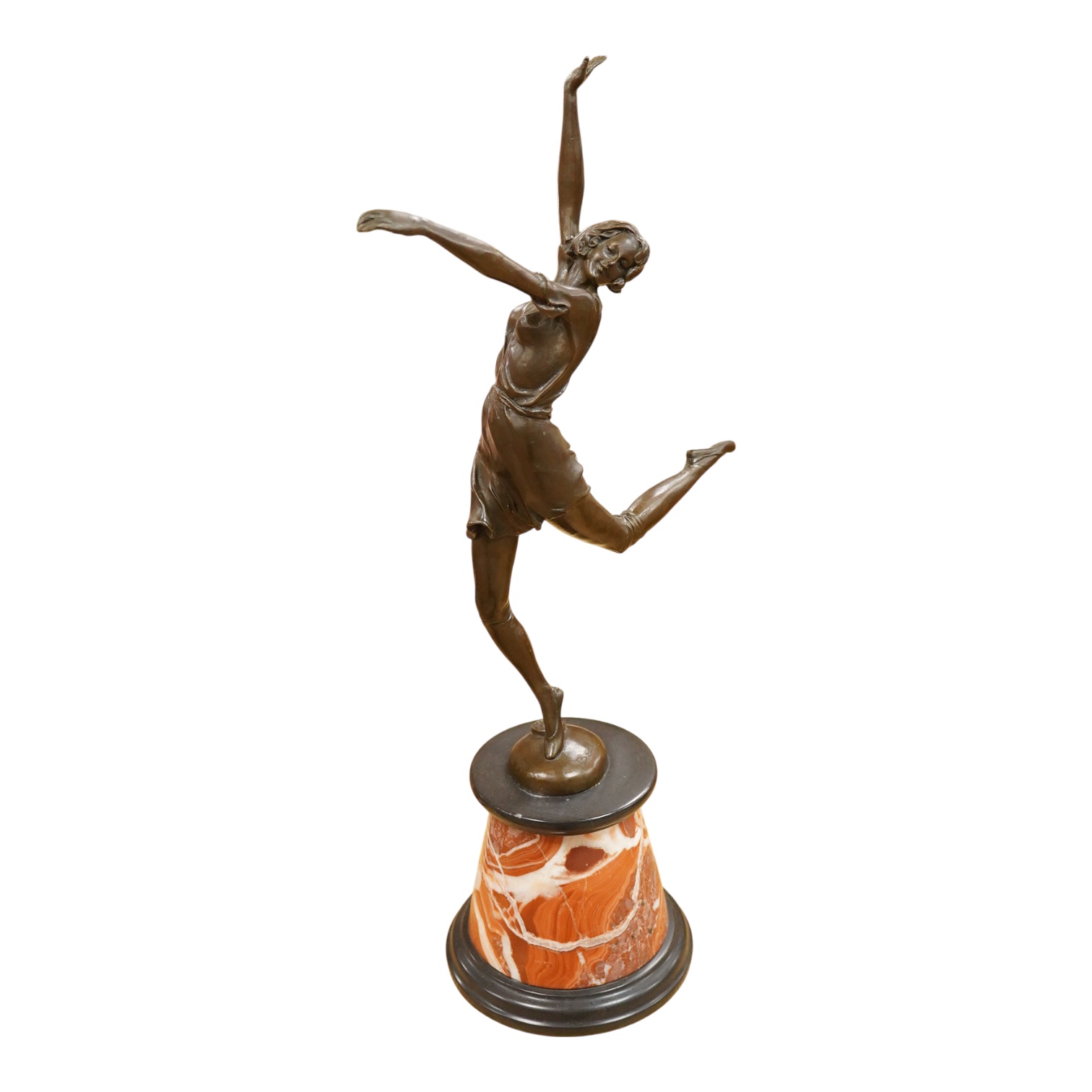 After Bruno Zach (1891-1945), an Deco style bronze of a dancing lady, raised on a marble and slate base, 65cm high